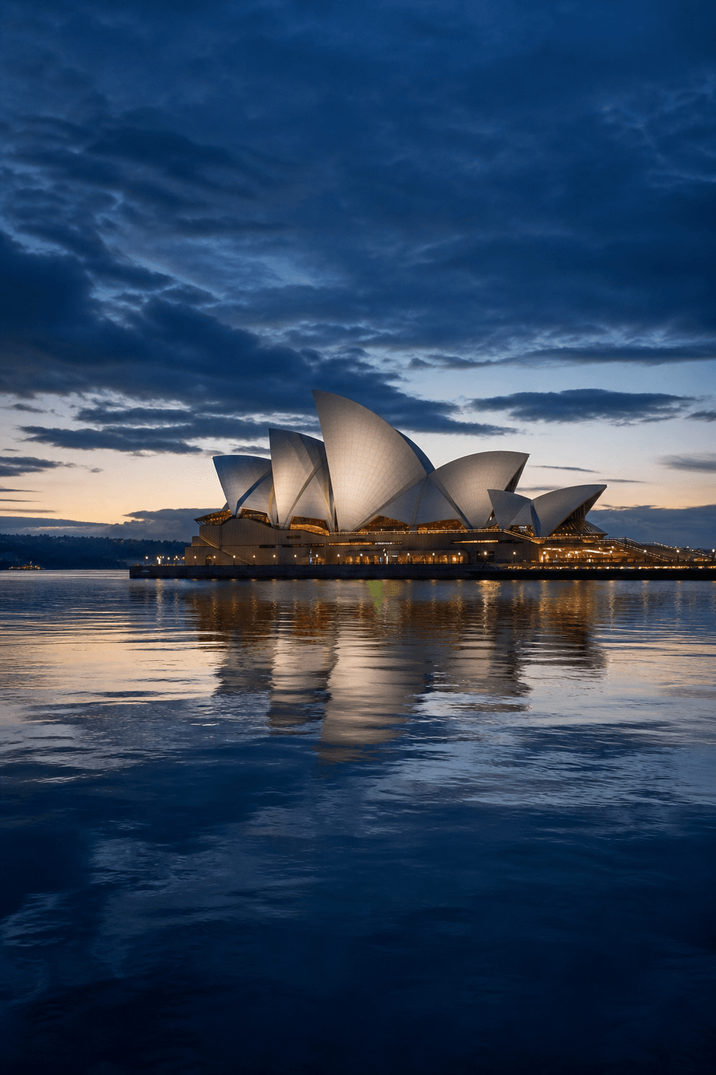 Sydney Opera House and harbour at dusk - Ideal Insurance Brokers NSW